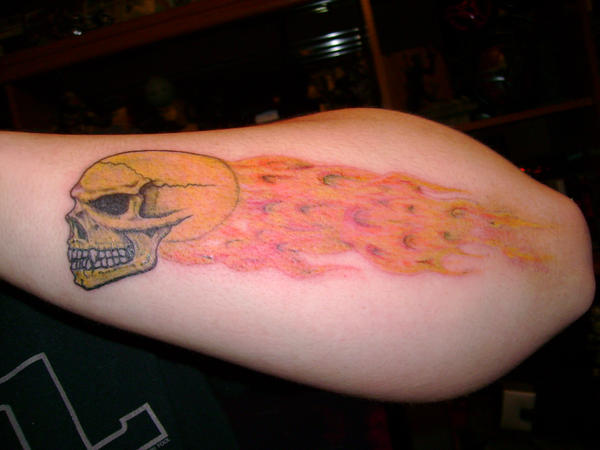 flaming skull tattoo by