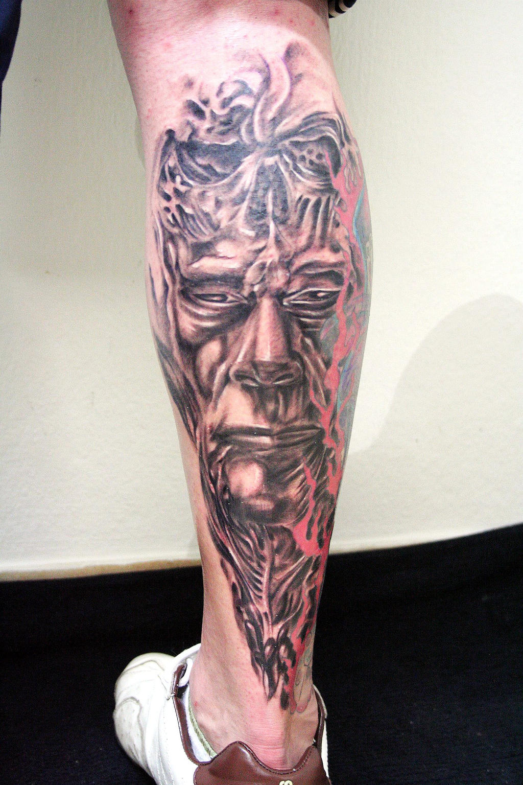 Face Skull Biomech Tattoo by