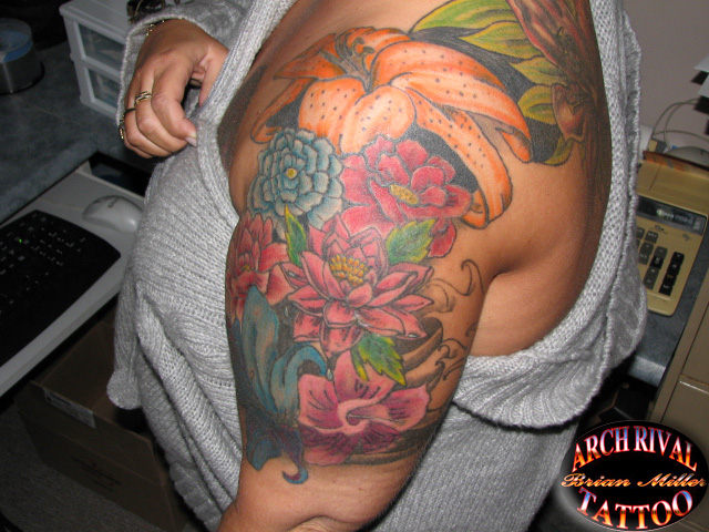 half sleeve flower tattoo by