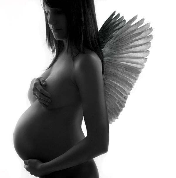 Pregnant_with_angel_wings_by_adamduckworth.jpg