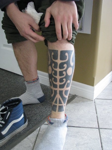 tribal leg tattoos