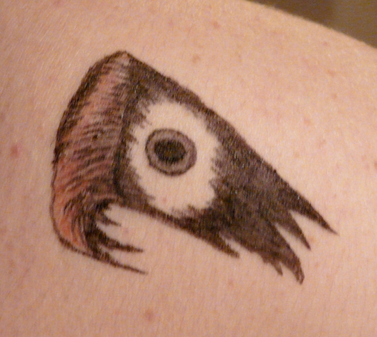 peeping eye - shoulder tattoo