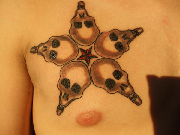 skull tattoo with crown. star tattoo. Skull Star
