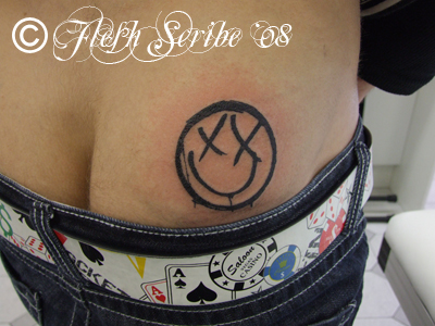 Blink 182 Smiley Tattoo by