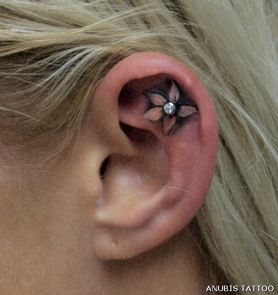 ear tattoo with piercing | Flower Tattoo