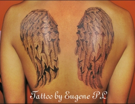 Wings on back tattoo by