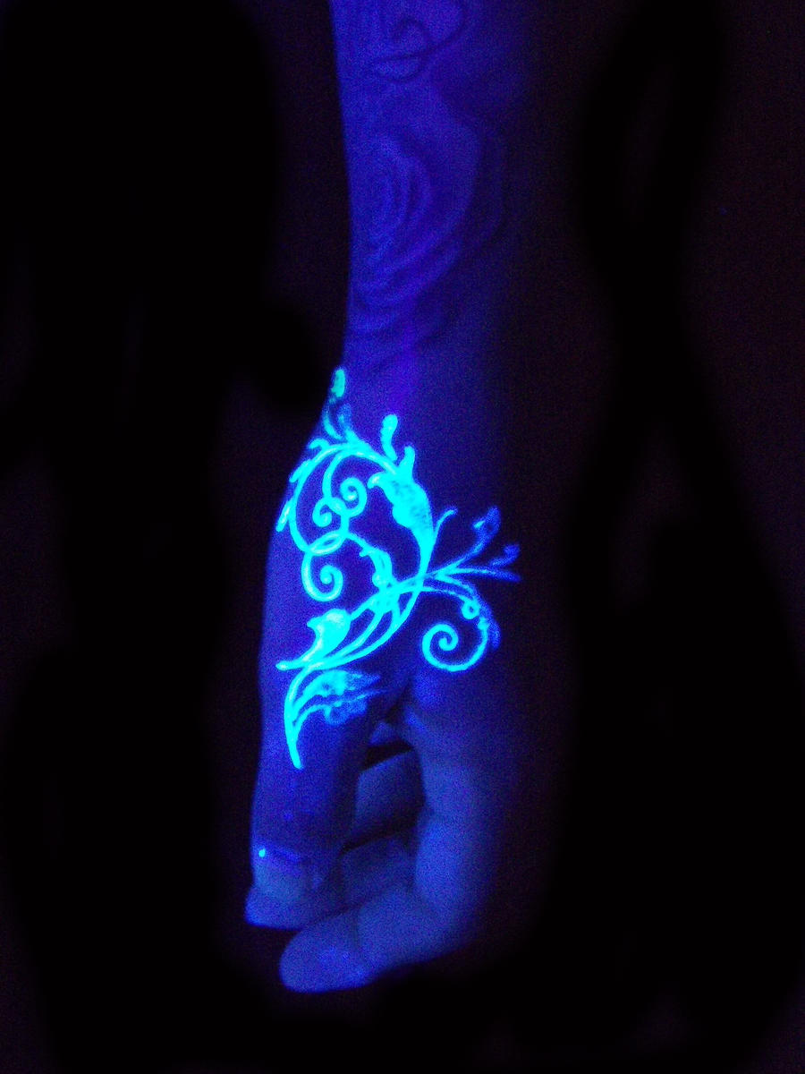 Filigree blacklight tattoo by