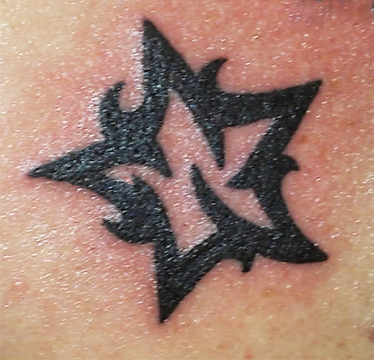 tribal star tattoo by