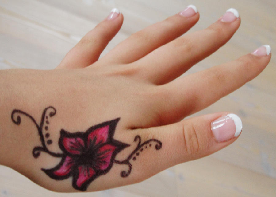 tattoos on hand flowers. flower tattoo on hand by ~Steph-LOL on deviantART